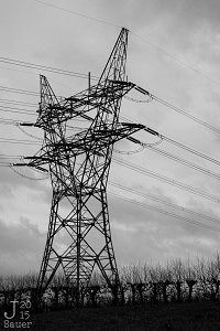 Electricity tower and stormy sky